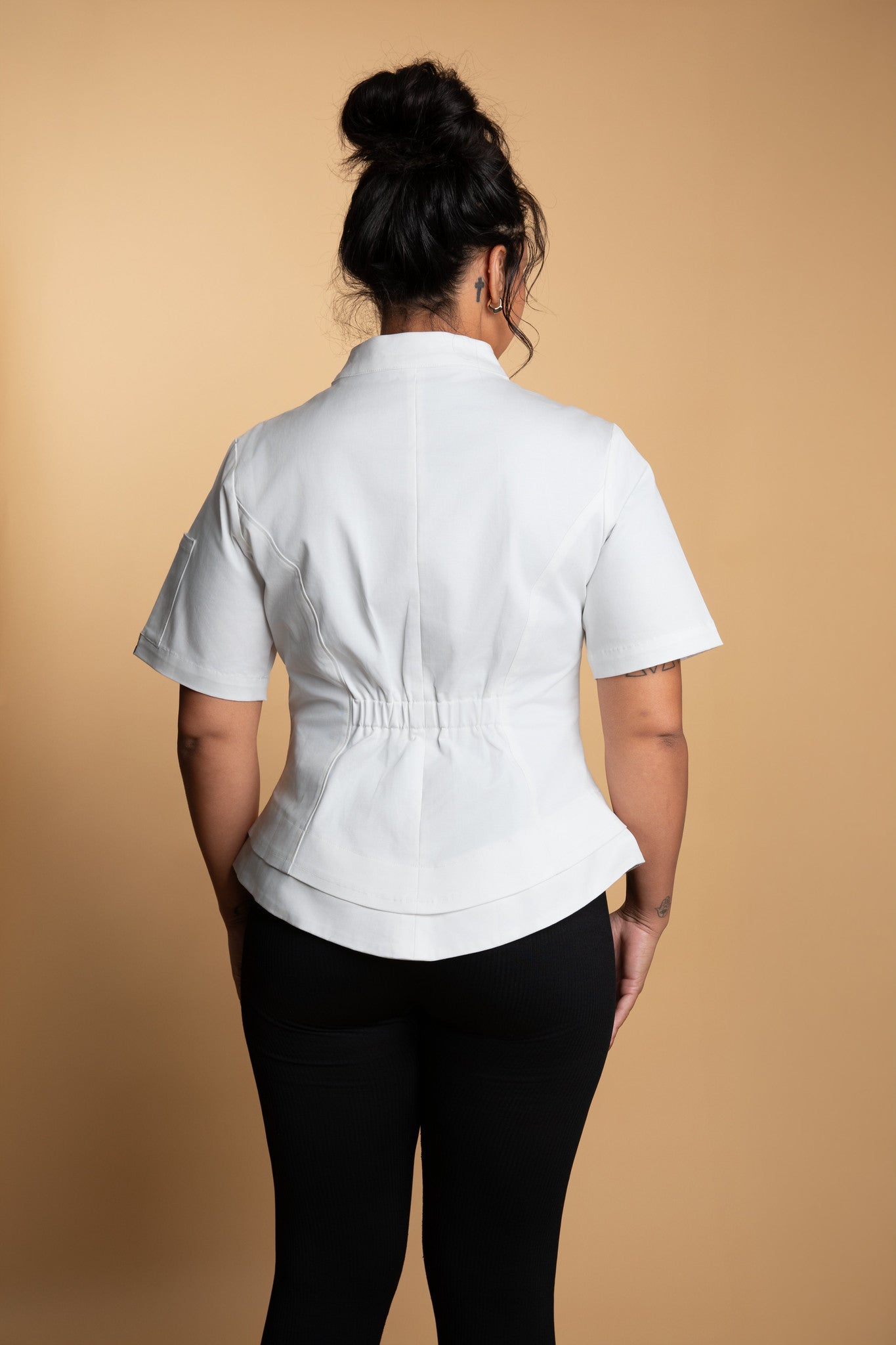 Flattering women’s chef uniform with cinched waist